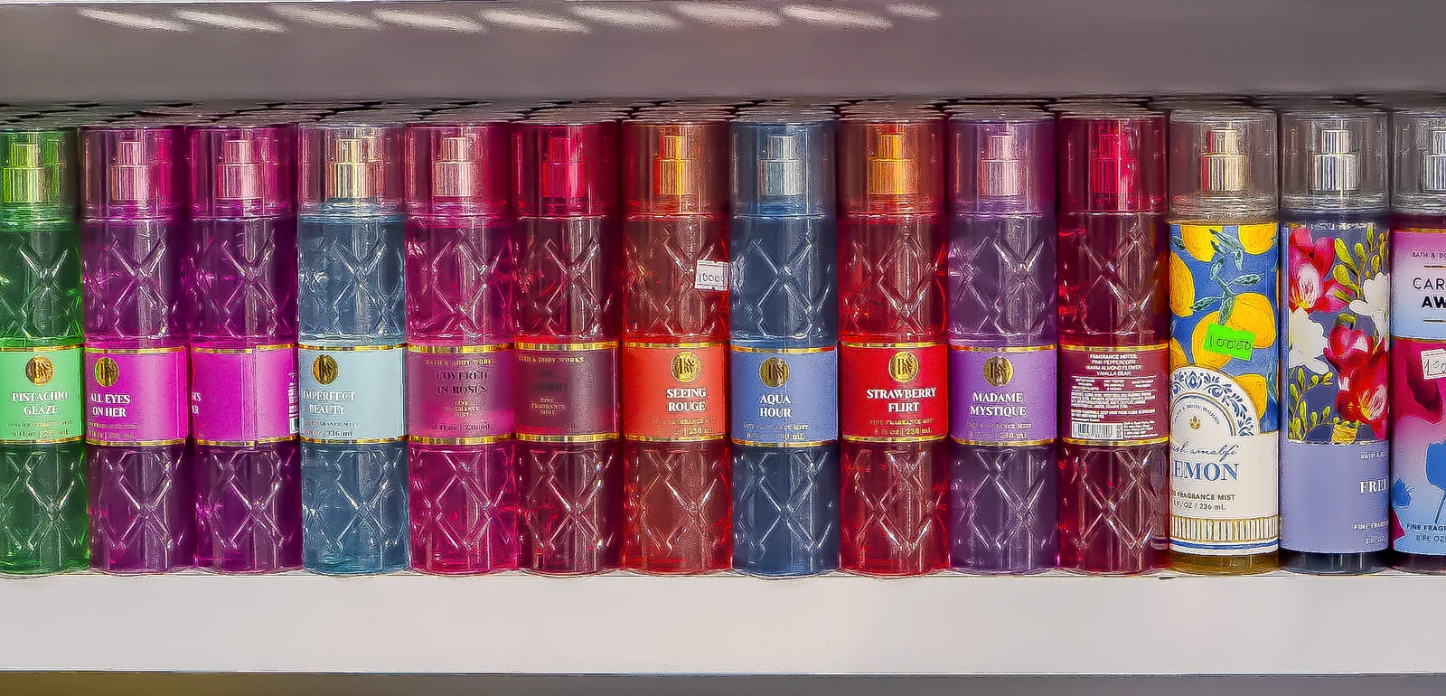Woman holding an Olay body lotion, House of BKN promotional banner